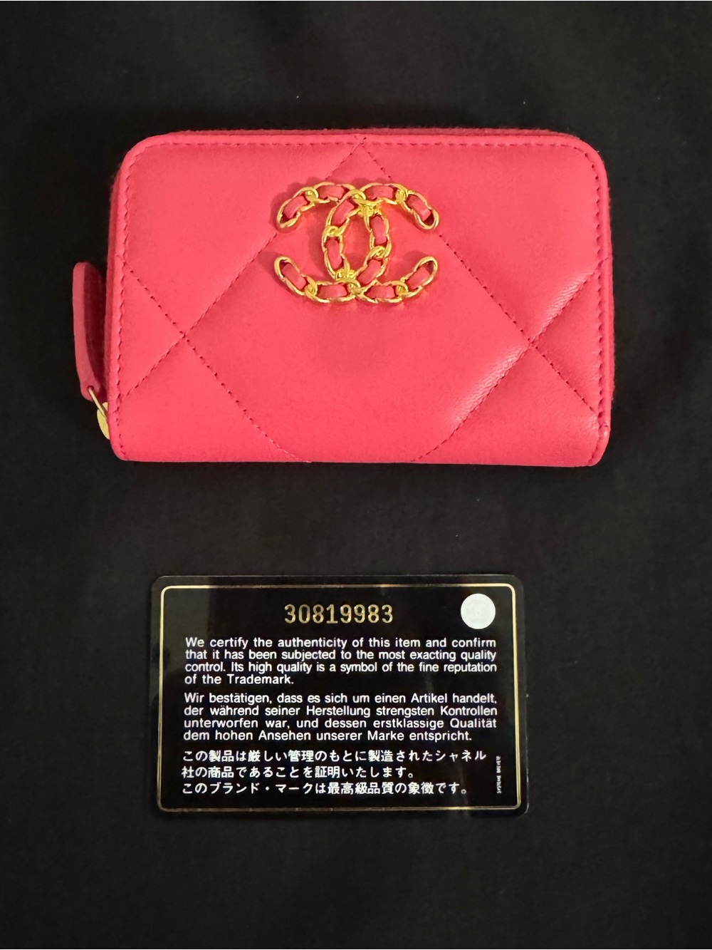 CHANEL 19 Quilted Chain-Logo Wallet in pink with Gold Hardware.